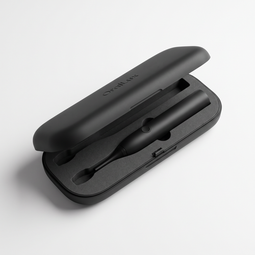 OralLux travel case open, showing contoured interior with the toothbrush handle seated inside